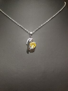 Silver Parrot Pendant Necklace with Yellow Gem